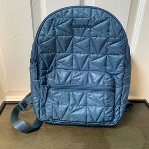 Michael Kors Winnie large back pack purse. Never used. New with tags